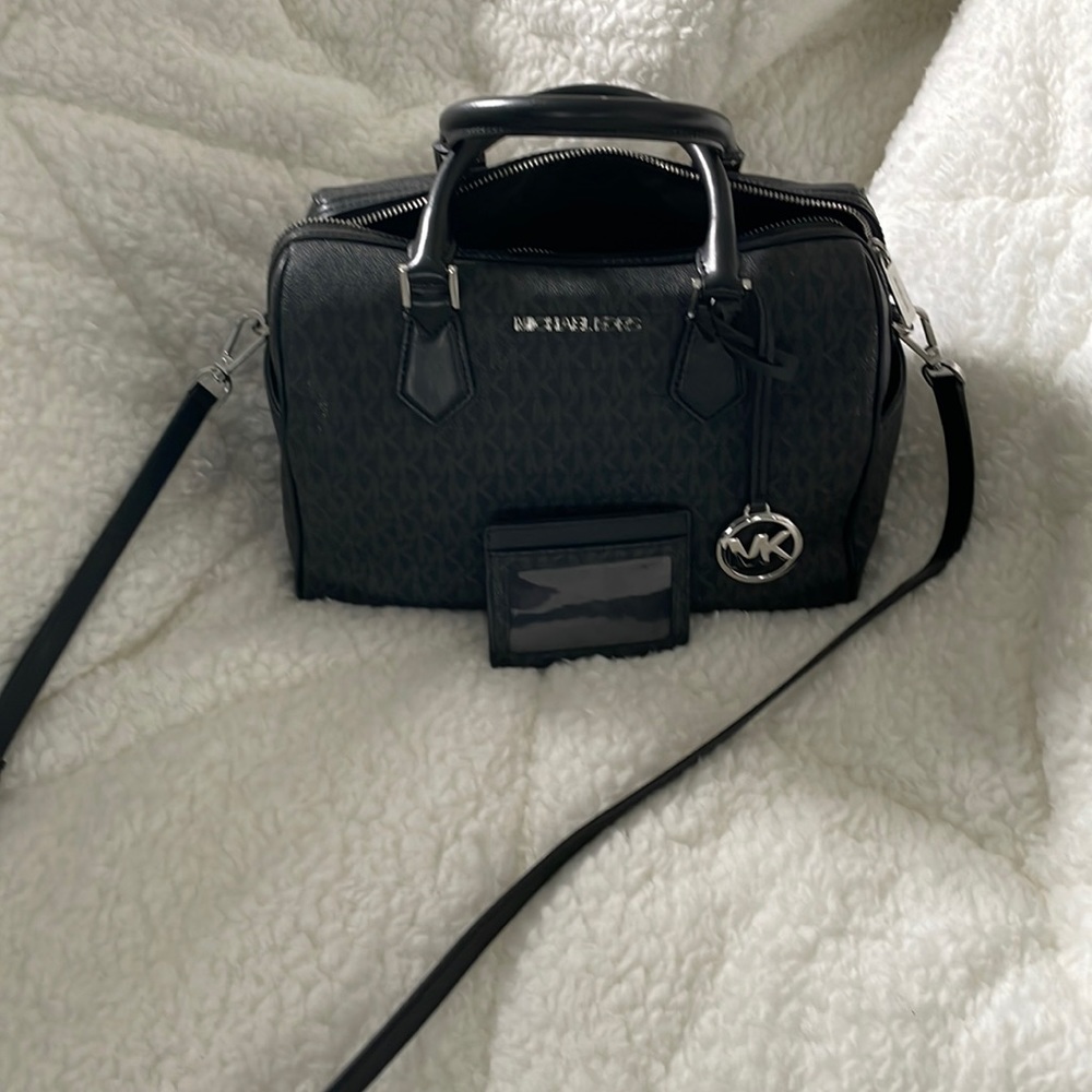 Michael Kors bag, large in size color is black and gray with silver hardware